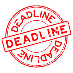 Grunge red deadline round rubber seal stamp on white background