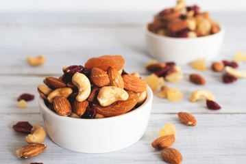 mixed nuts and dried fruit in bowl 
