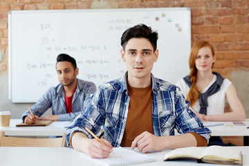 Guy preparing for lesson or seminar