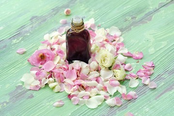 Rose essential oil and flowers petals for Spa treatments 