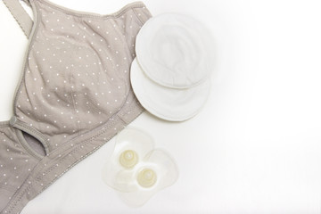Nursing bra for mothers and Silicon nipples. moms bra with new disposable breast pad. Prevents the flow of milk on the clothes, it is convenient to unfasten the cups for feeding the baby