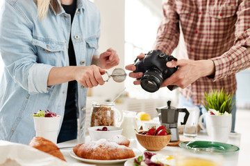 Food-photographer and food-stylist producing food advert