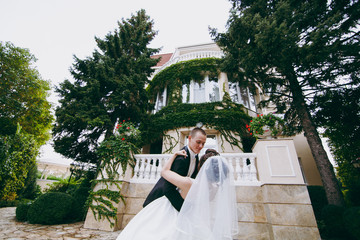 Beautiful wedding couple on a walk outdoor
