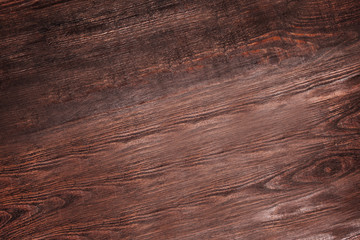 Fototapeta premium Brown wooden textured background top view. Nobody