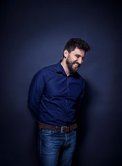 The young man looking at camera