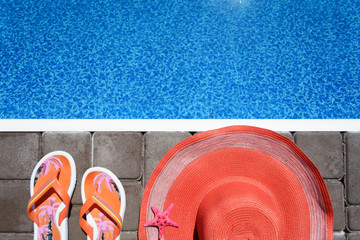 Summer female hat and vetnamki at the blue pool. Summer and rest.