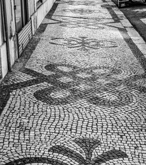 The typical tiled sidewalks in Lisbon