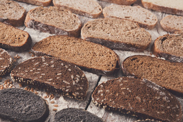 Bakery concept. Plenty of sliced bread background
