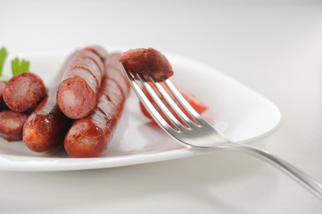 Sausages on a white background
