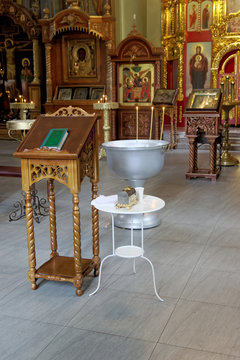 The baptism of a child in the Orthodox Church. Everything is prepared for baptism.