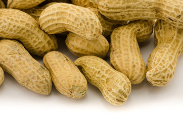 Macro closeup of Peanuts, isolated on white background