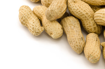 Macro closeup of Peanuts, isolated on white background
