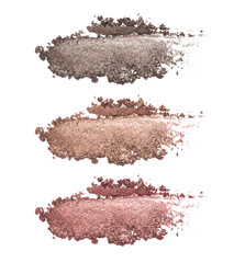 Set of eyeshadow sample isolated on white background. Crushed brown metallic eyeshadow. Closeup of...