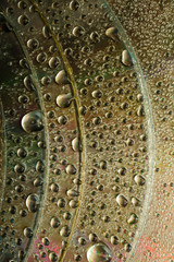 Colorful, rainbow, abstract background. Water drops. Condensate. Texture of glass. Parallel lines. Wallpaper.