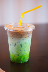 Ice coffee fusion three layer (espresso,milk and Matcha green tea)