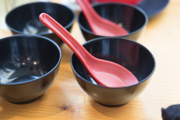 Black bowl with spoon