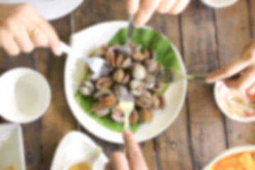 Blur background eating seafood