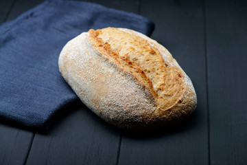 Handmade bread on black table