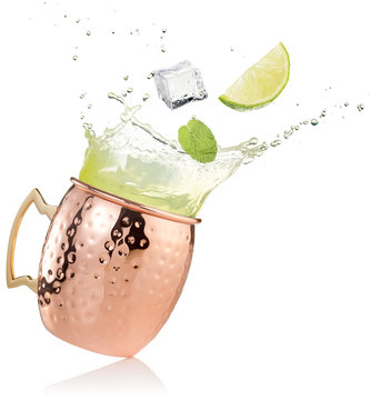 splashing moscow mule cocktail on white background