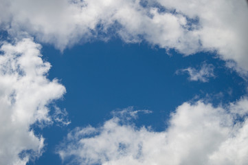 White clouds against the blue sky.