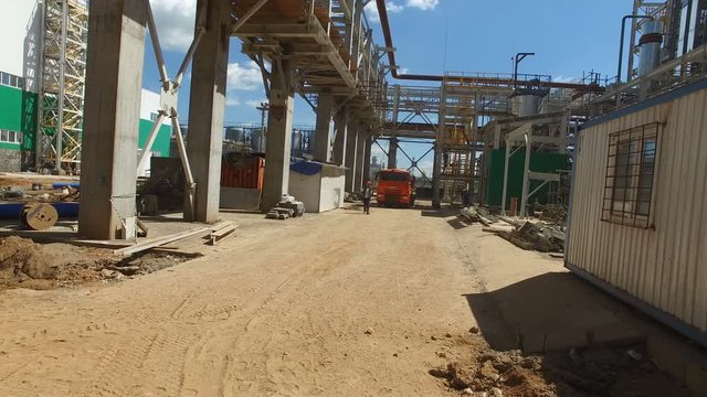 Motion from Temporary House among Repair Plant Construction