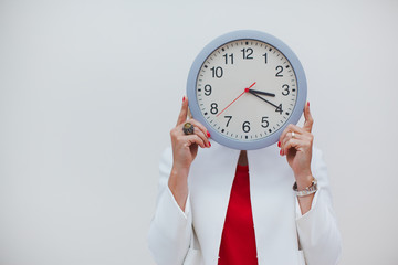 Woman with clock time management and biological time concept