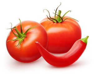 Whole fresh red tomatoes with green leaves and chili pepper