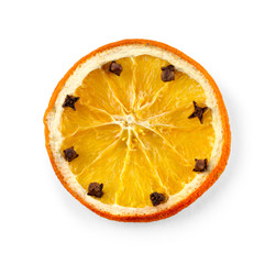Dried orange slice decorated cloves, isolated on white background