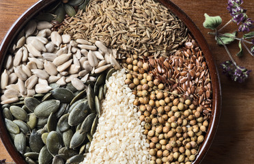 Obraz premium Spices and herbs in ceramic bowl. seasoning. Colorful natural additives.