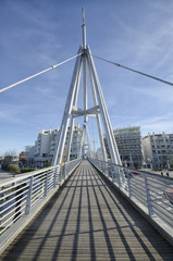 Pedestrian bridge in a modern city