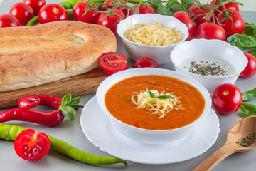 Chorba soup tomato ready-made dish served with vegetables, spice and pita bread
