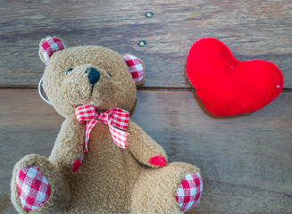 bear doll and red heart