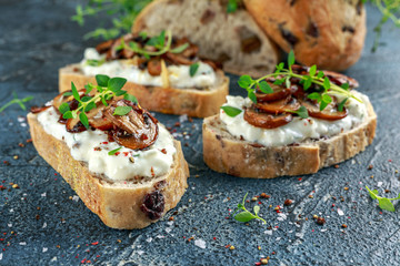 Garlic mushroom toast with creamy herbed ricotta chees spread