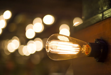 Incandescent lamps in a modern cafe. Edison lamp.