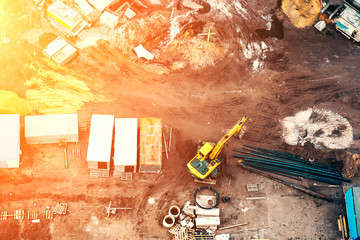 Top view of building foundation and construction site with sunset light filter