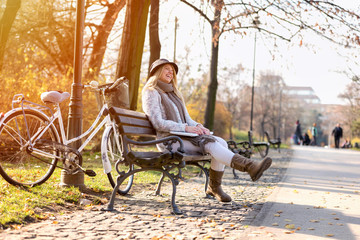 Group of smiling college girls in park taking selfie