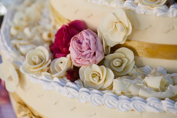 Beautiful wedding cake decorated with roses