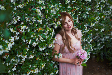 Single woman in bridal dress dreaming of marriage