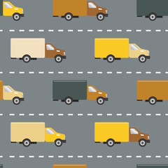 Seamless pattern with colorful trucks in flat style on the road