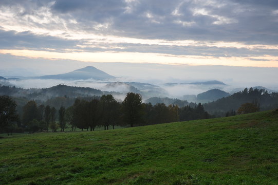 Early evening landscape with fog
