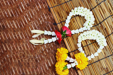 Thai style bouquet use in traditional on bamboo floor