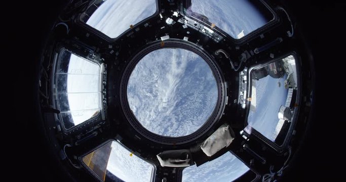 POV, earth rotates from satellite window