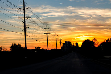 Fototapeta na wymiar Telephone Lines during Sunset