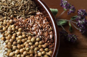 Spices and herbs in ceramic bowl. seasoning. Colorful natural additives.