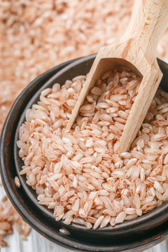 Raw Organic Devzira Rice on a white table closeup