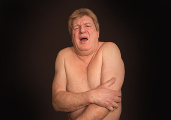 Naklejka premium Senior man with osteoarthritis pain