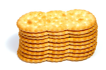 Salted cracker isolated on over white background