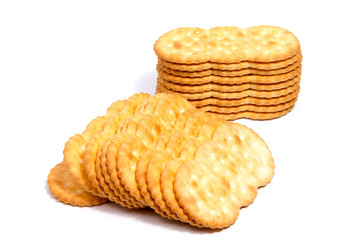 Salted cracker isolated on over white background