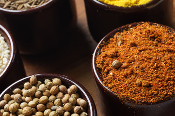 Spices and herbs in ceramic bowls. seasoning. Colorful natural additives.