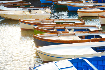 Fototapeta na wymiar Colorful stylish old boat on the water